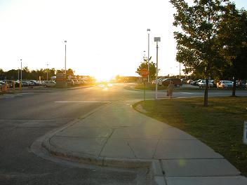 photo of low sun obscuring stop sign