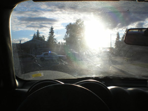 Photo of sun glare through driver's side windshield.